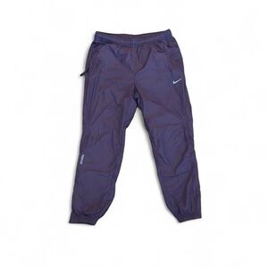 Nike NOCTA Purple Windbreaker Jogger Pants